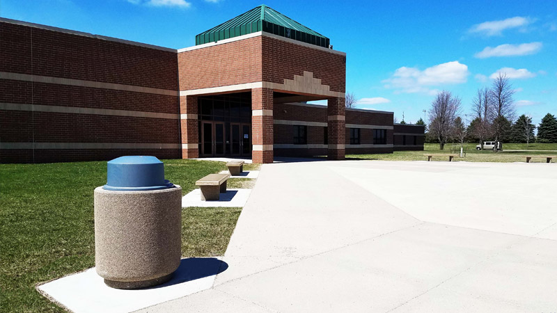 Bohlmann concrete planters and benches outside of Carroll High School